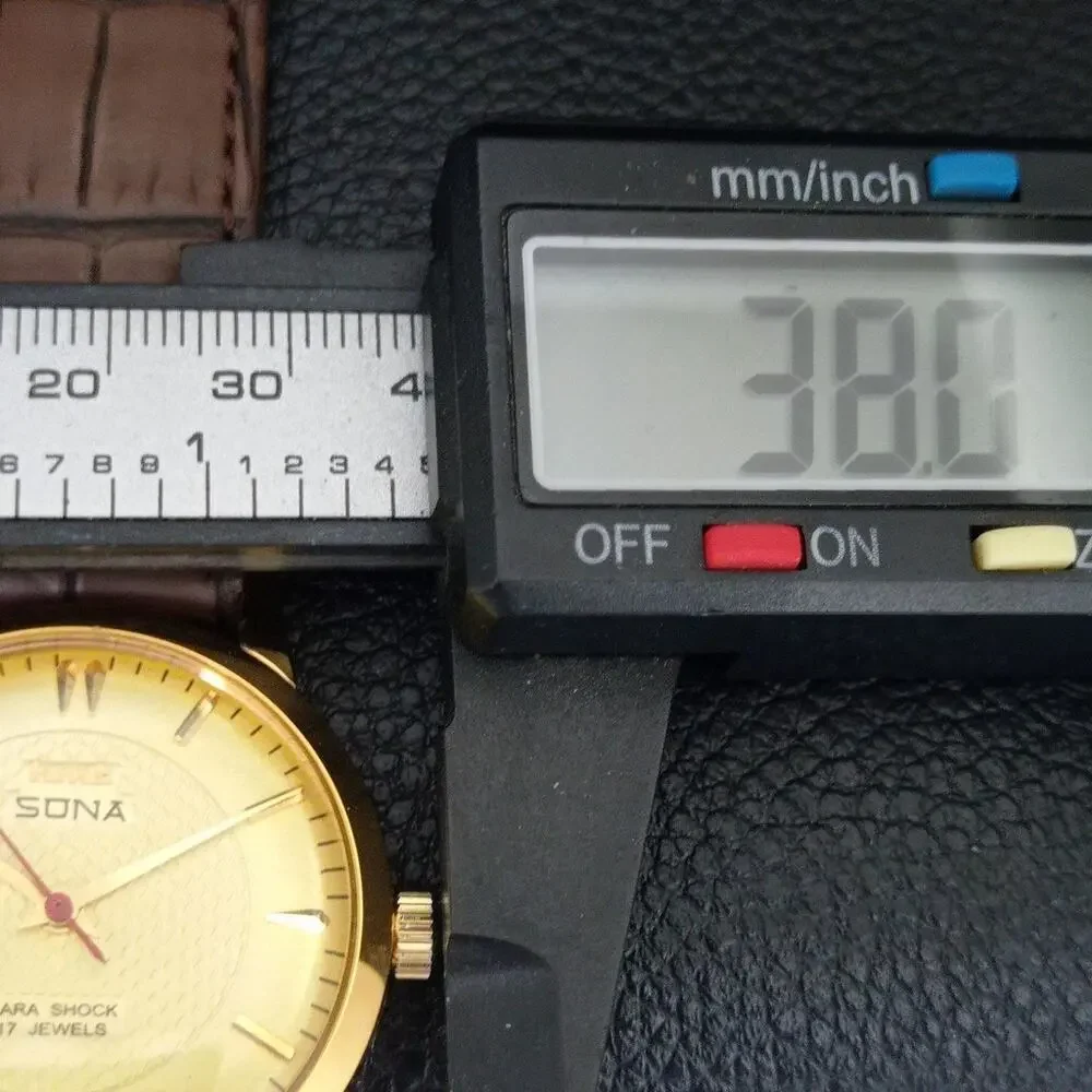 Vintage 1987 HMT Manual Wound Mens Gold Watch & Red accents